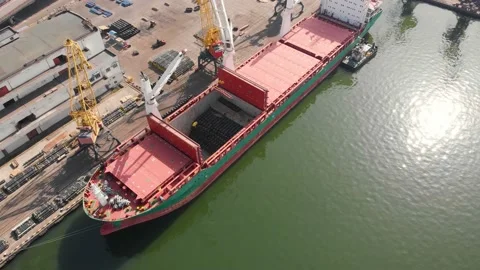 Aerial view of the ship loading near the berth in the port. Loading the wire rod Stock Footage 88386566