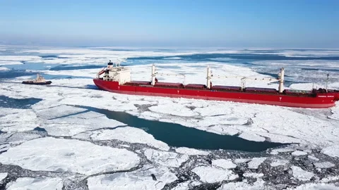 Aerial view. The ship sails through the sea ice in the winter, close-up Stock Footage 86821491