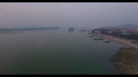Aerial view of ships docked on Brahmaputra river bank Guwahati Stock Footage 339268253