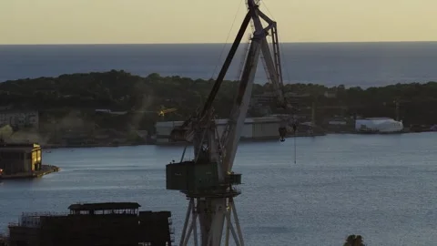 Aerial view of shipyard cranes in Pula, Croatia. Stock Footage 346487582