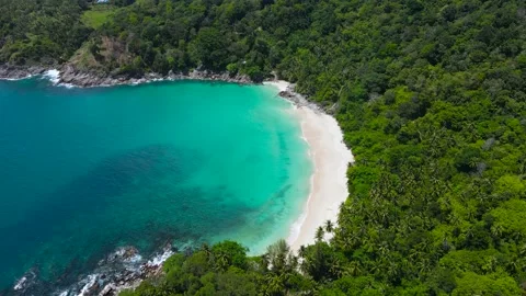 Aerial view shot. Drone camera over white beach sand and sew water clear. Nature Stock Footage 153383726