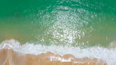 Aerial view shot. Drone camera over white beach sand and crystal sew water in su 動画素材 172386434