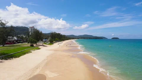 Aerial view shot. Drone camera over white beach sand and crystal sew water in su Stock Footage 172386506
