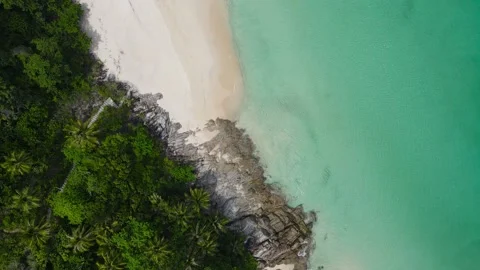 Aerial view shot. Drone camera over white beach sand and sew water clear. N.. Stock Footage 233794423