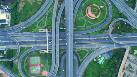 Aerial view shot of fast moving above interchange and multi junction road 스톡 동영상 209168230