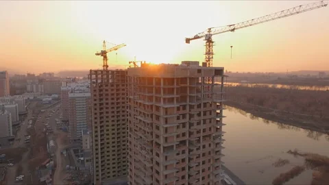 Aerial view shot of the sunset on the construction of a new district on the Bank Stock Footage 89093511