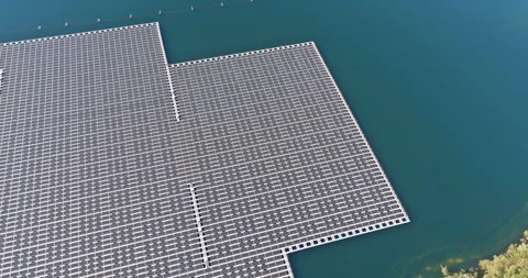 Aerial view showcases expansive array of solar panels, creating a visually Stock Footage 244870719