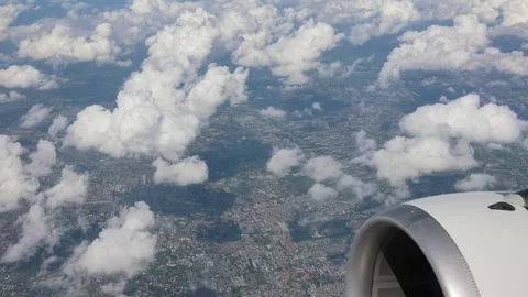 Aerial view showcases white fluffy clouds. Stock Footage 305459042