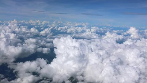 Aerial view showcases white fluffy clouds. Stock Footage 305460066