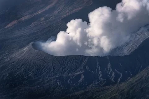 An Aerial View Showcasing an Active Volcano Erupting with Thick Clouds of S.. 스톡 사진