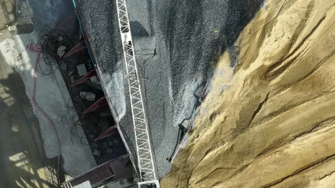 An aerial view showcasing a cement mixing plant. Stock Footage 306899448
