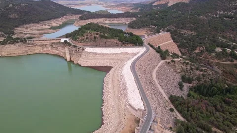 This is an Aerial View showcasing the striking features of a Reservoir and its Stock Footage 294627196