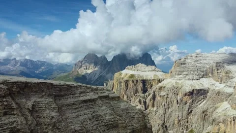Aerial view showcasing towering rock formations in the Italian Dolomites Video stock 342340797