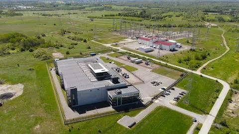 Aerial view showing AI data center with electrical substation Stock Photos