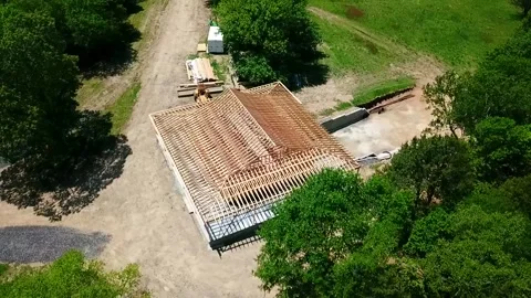 An aerial view showing the framing in a single family home construction Stock Footage 342568866