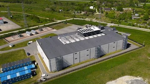 Aerial view showing a large data center and power infrastructure 스톡 사진