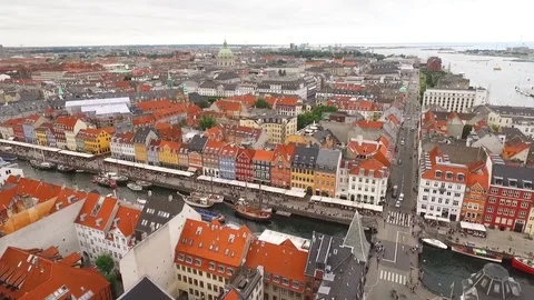 An aerial view shows the cityscape bordering the Nyhavn canal in Copenhagen, Stock Footage 129443135