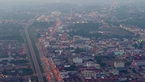 Aerial view shows highway and traffic lights glowing red Vidéo 337984161