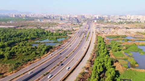 Aerial view shows a highway with multiple lane Stock Footage 299784788