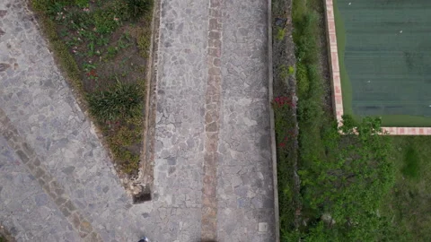 Aerial view shows a long line of cars waiting in a rural environment, Stock Footage 239525449