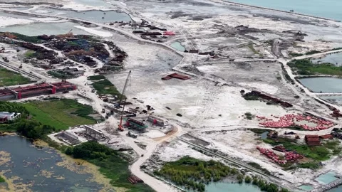 Aerial view shows massive construction in progress Stock-Footage 337999578