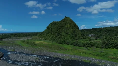 Aerial view shows river winding through lush valley. Stock Footage 336852237