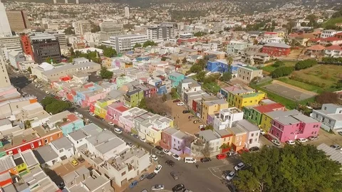 An aerial view shows traffic bustling in the city of Bo-Kaap in Cape Town, South Stock Footage 129443061