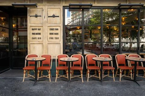 Aerial view of sidewalk cafe with table and chairs in Paris Stock Photos