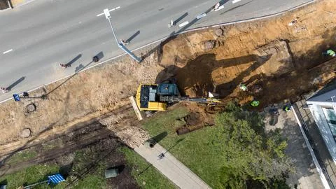 Aerial view of sidewalk construction with workers and equipment Stock Photos