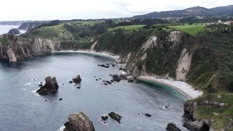 Aerial view of Silence Beach with rugged cliffs and rock formations, Spain. Stock Footage 334344715