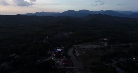 Aerial view silhouette sunset sky with sun light sky cloud mountain forest Stock Footage 134448532