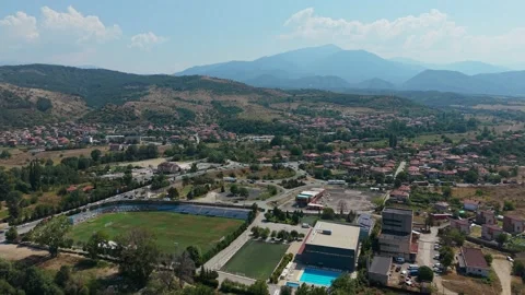 Aerial view of Simitli town and roundabout with mountains in Bulgaria Stock Footage 343577883