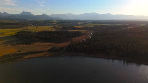 Aerial view of Sims River flowing into Simssee near Rosenheim, Germany, from Video stock 316627379
