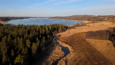 Aerial view of Sims River flowing into Simssee in Upper Bavaria, Germany Stock Footage 316652124