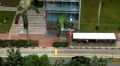 Aerial View of Singapore, Bus Stop in China Town, Busses and Cars Traffic HD Footage
