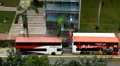Aerial View of Singapore, Bus Stop in China Town, Busses and Cars Traffic HD Footage