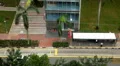Aerial View of Singapore, Bus Stop in China Town, Busses and Cars Traffic HD Footage