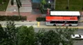 Aerial View of Singapore, Bus Stop in China Town, Busses and Cars Traffic HD Footage