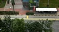 Aerial View of Singapore, Bus Stop in China Town, Busses and Cars Traffic HD Footage