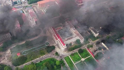 Aerial view of Singha Durbar engulfed in fire in Kathmandu, Nepal. Stock Footage 346682392