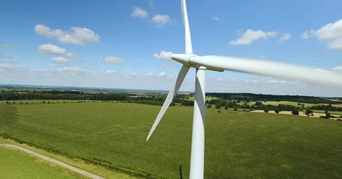 Aerial view of a single wind turbine Stock Footage