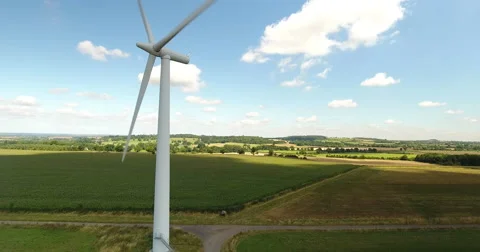 Aerial view of a single wind turbine Stock Footage