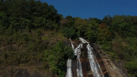 Aerial view Siriphum waterfall with Cherry blossom flowers in Thailand. Video stock 102422880