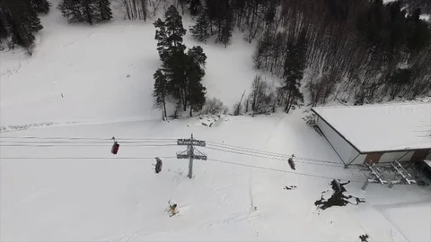 Aerial view of the ski-lift elevator in Arkhyz ski resort in Caucasian mountains 動画素材 70593694