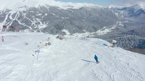 Aerial view of ski slope with ski riders Stock Footage 231050659