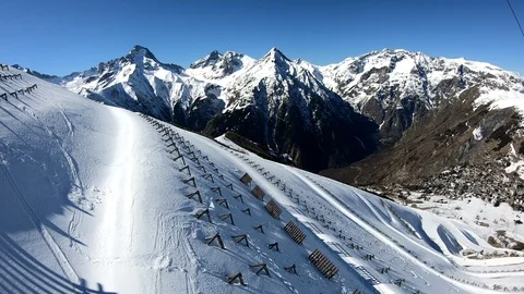 Aerial view of ski slopes in Les Deux Alpes, French Alps Stock Footage 105444655