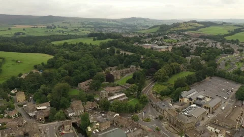 Aerial view of Skipton Castle revealing Skipton town centre Stock Footage 292126366