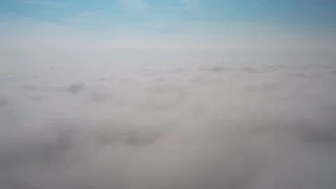 Aerial view of the sky and clouds that the camera flies into Stock Footage 146678123