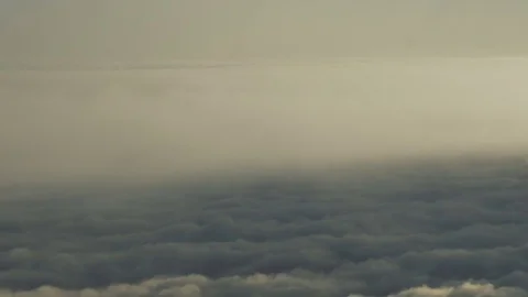 Aerial view of sky clouds from an airplane window Stock Footage 83677983