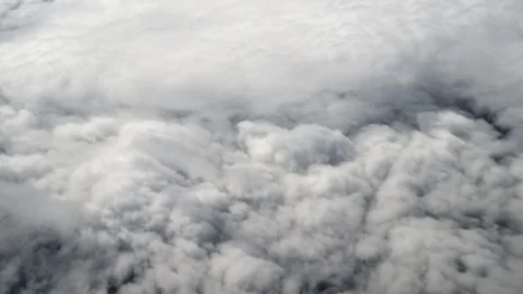 Aerial view of sky cyclone typhoon hurricane clouds from airplane Stock Footage 113298526